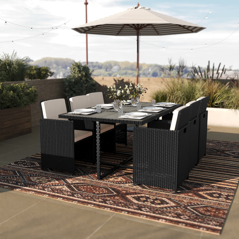 Somerville 7 Piece Patio Dining Table Set, Space Saving Black Wicker Modular Chairs-Cream Cushions & Acacia Wood Table Top